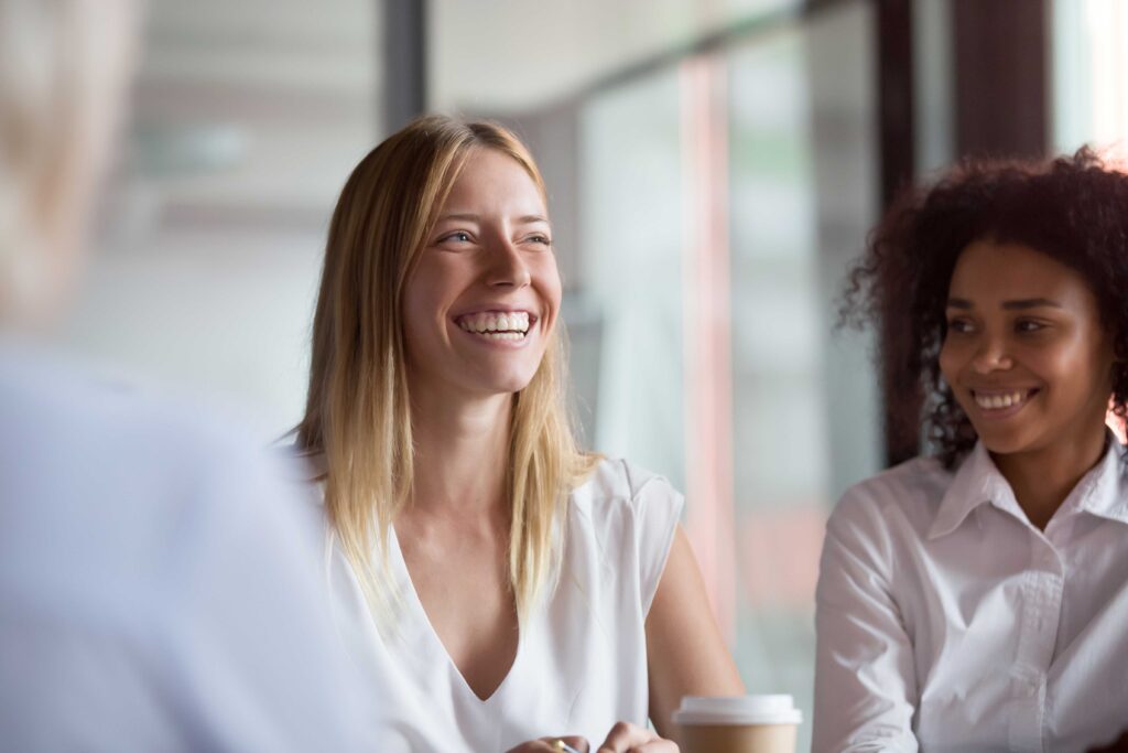 Smiling woman in DBT therapy.