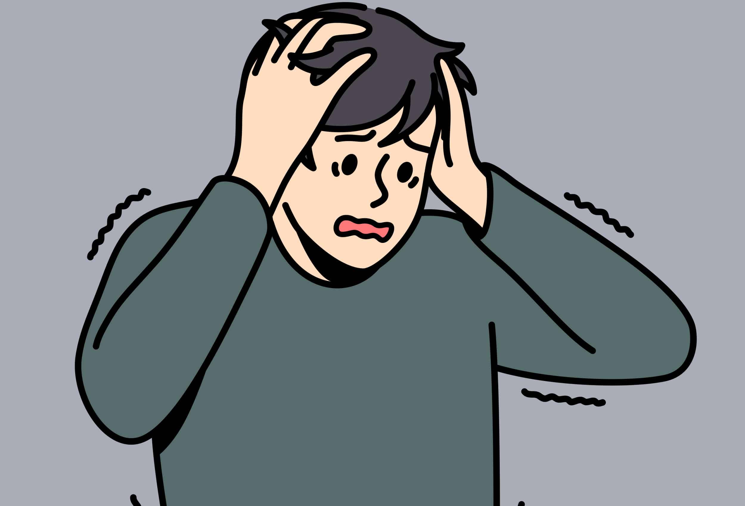 Person looking distressed and holding their head