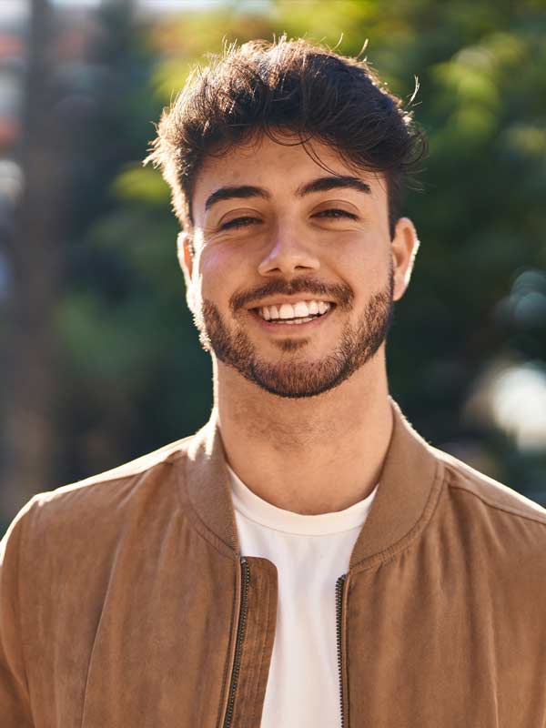 Young man happy with finally finding the right balance of medication.