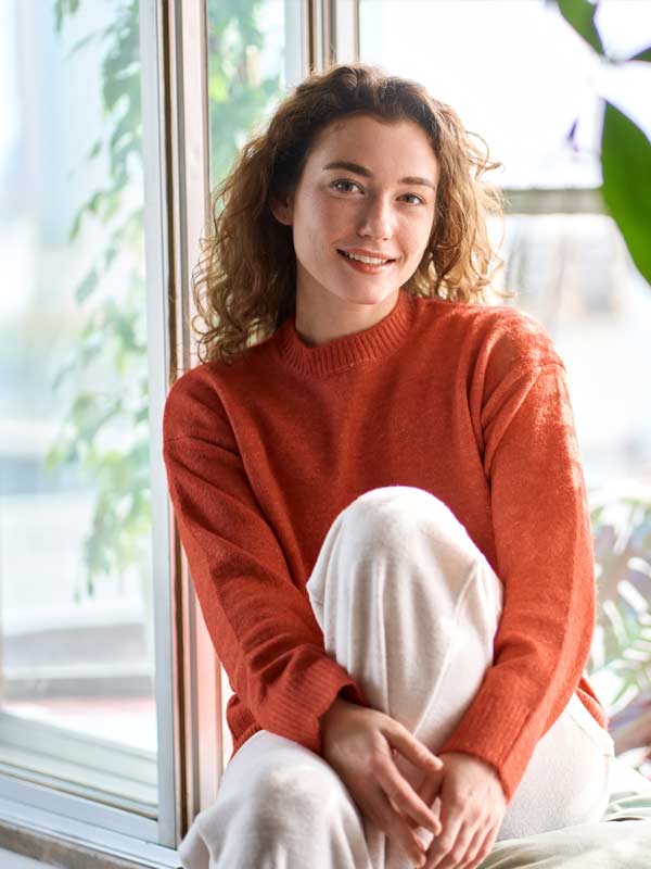 Young woman happy having resolved her codependency issues;