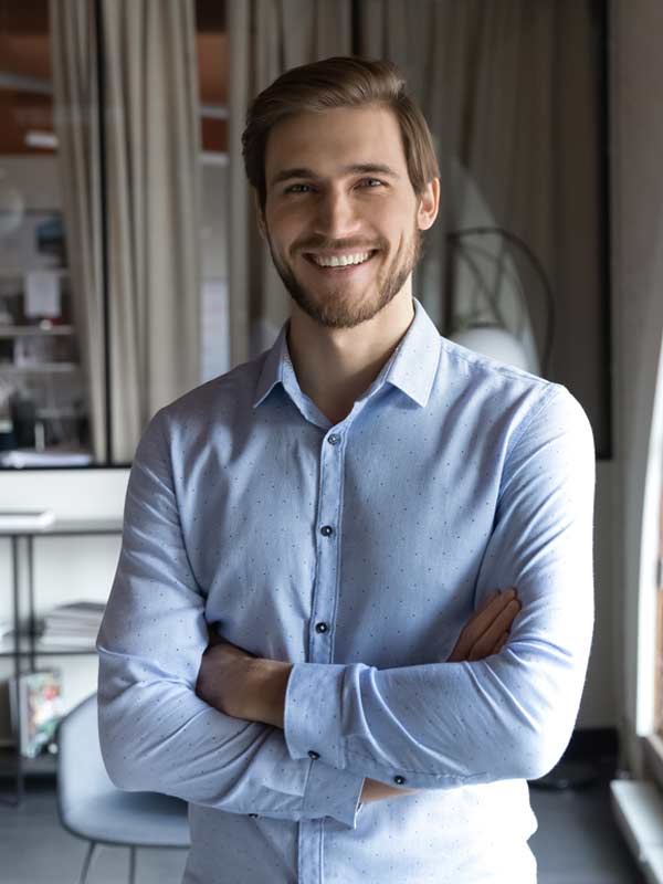 Man happy and in control at work.