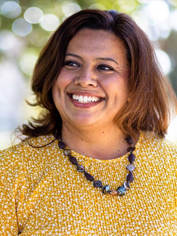 Clinical-Depression-Treatment-and-Mental-Health-Support-2 African American woman happy and smiling post mental health treatment.